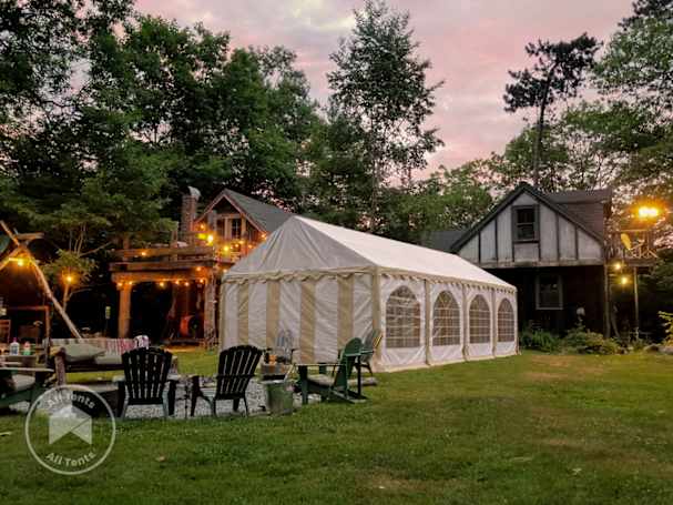 Evening party in the garden with a marquee gazebo