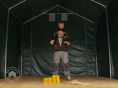 Storage tent with chipboard floor