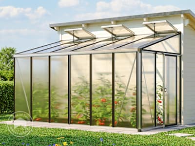 large walk in greenhouse against a wall in a yard with three roof vents open and double sliding doors