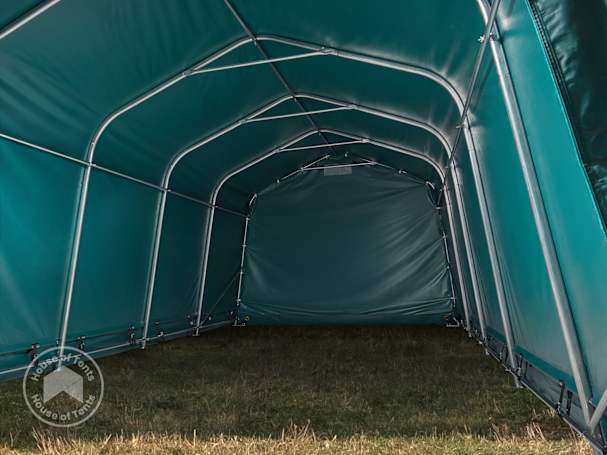 The strong steel frame of a farm storage tent