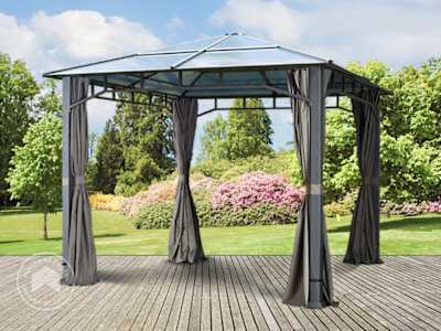 Garden gazebo with a hardtop roof on a patio near a garden