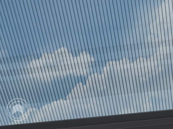 Close-up of 6 mm twin-wall polycarbonate roof panel for garden gazebo, showing light transmission and UV protection