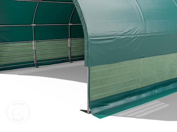 Un filet brise-vent comme protection pour abrie de prairie