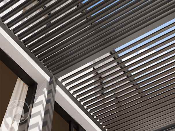 Pergola bioclimatique avec toit plat à lames